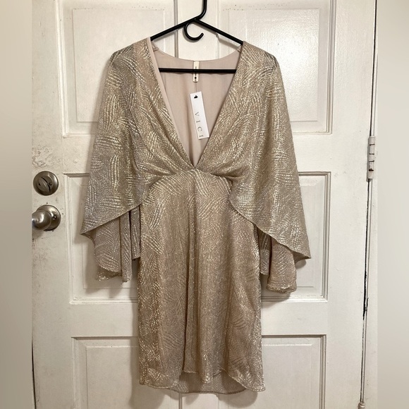 Tyche Dresses & Skirts - ✨NWT✨Tyche Metallic cape mini dress